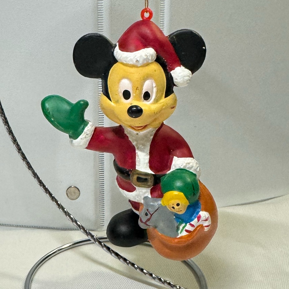 Disney Mickey Mouse Christmas tree ornament Santa Claus holding sack of toys VTG